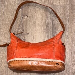 The Sak Red and Tan Leather Shoulder Bag
